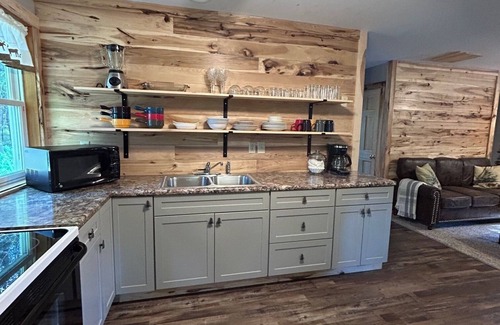 Marienville House | Cozy Cook Forest cabin near trails—perfect for family getaways & nature escapes.