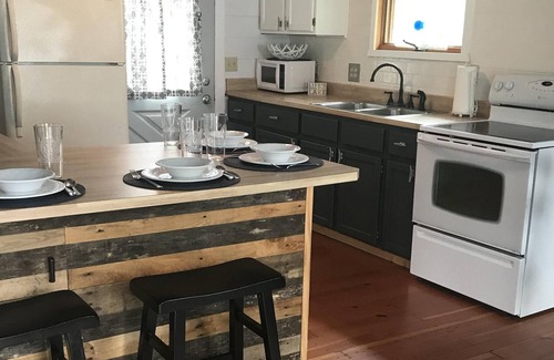 Breezy Point Cabin | Cozy Cottage at Breezy Point