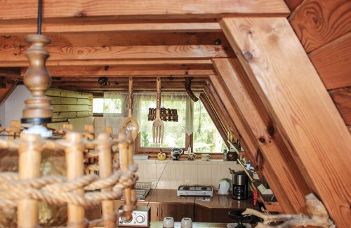 Olsztynek House | Cozy cottage for a relaxing vacation by the water.
