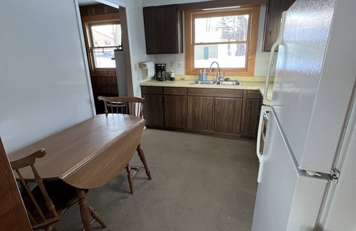 Houghton Lake House | Cozy Cottage, fresh laid sod, new concrete patio and sidewalk, sandy beach!