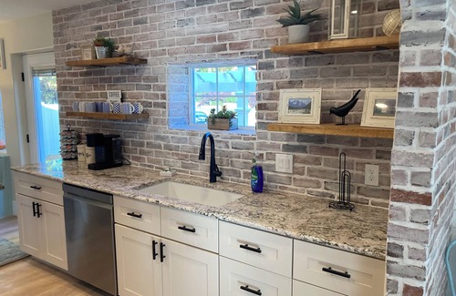 Monroe House | Cozy Cottage in Monroe. Newly remodeled with fun amenities including hot tub!