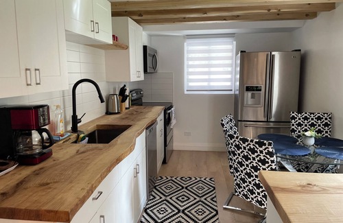 Township of Woolwich House | Cozy Cottage Style House by Grand River