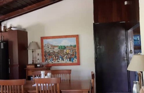 Panajachel Cottage | Cozy country cottage with wooden ceilings and stone walls within nature reserve.