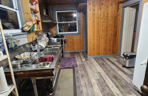 Port Burwell House | Cozy couples vacation home 2 minutes to beach with backyard over looking harbour