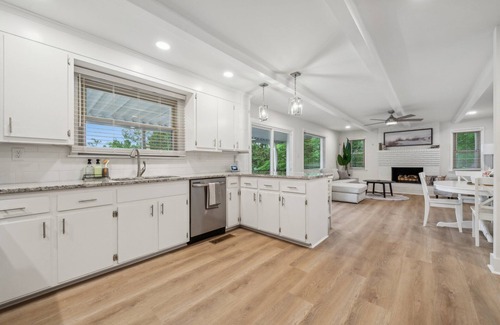 Southmont House | Cozy Cove-Lakefront home with kayaks, paddle board, lillypad, arcade, & fire pit