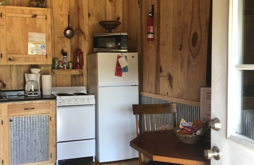 Perkinston Cabin | Cozy Creekside Scarlet Cabin on the Creek with 2 beautiful sandbars