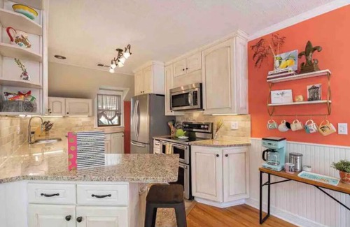 Sloan Lake House | Cozy Creole Cottage by Sloan's Lake.