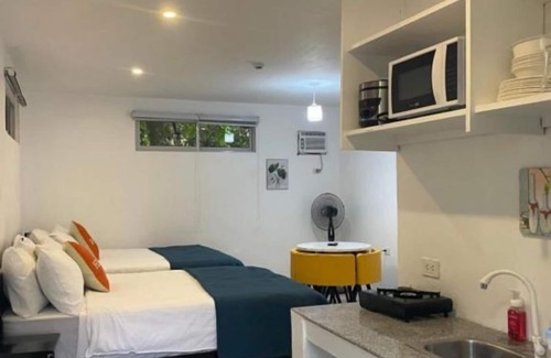 Sipalay Hotel | Cozy Deluxe Suite in Lopez Beach Resort