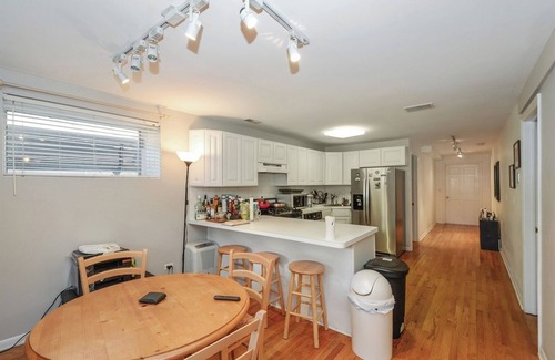 Wrightwood Neighbors Apartment | Cozy Depaul/Wrigley Garden Condo +FREE Parking!