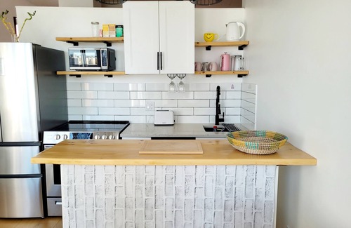 Downtown Edmonton Condo | Cozy Downtown Loft With River-View