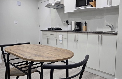 Winnipeg House | Cozy Family-sized basement suite.