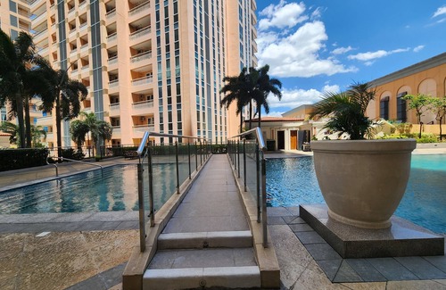 Pinagsama Condo | Cozy Family Unit Interconnected To The Grand Canal Mall with Parking On Premise