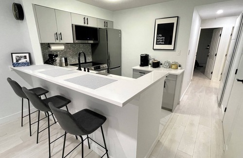 Village North House | Cozy fully renovated townhome,free parking. Minutes away from Whistler Village.