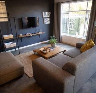 Queenswood Apartment | Cozy Garden Cottage with Solar Power