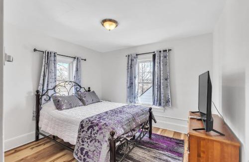 Garfield Heights House | Cozy Getaway with Hot Tub, Patio & Fenced Yard home