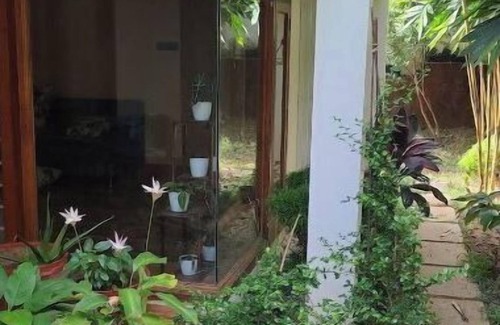 Varkala House | Cozy Glass Villa home. Five minutes walk to the happening Varkala cliff