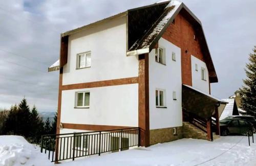 Kopaonik Apartment | Cozy ground level apartment with outdoor access across from Kraljevi Čardaci.