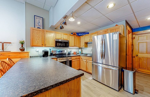 Carrabassett Valley Apartment | Cozy, ground-floor duplex retreat with direct shuttle service to Sugarloaf