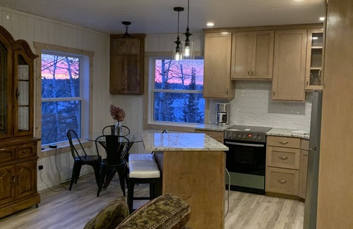 Manitoba House | Cozy Guest cottage waterfront with screened in gazebo