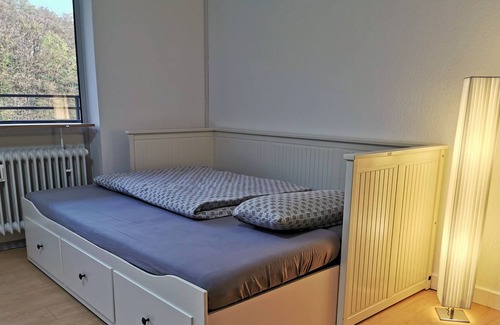 Buseck Apartment | Cozy holiday apartment with a view of the forest and a balcony in Gießen-Buseck