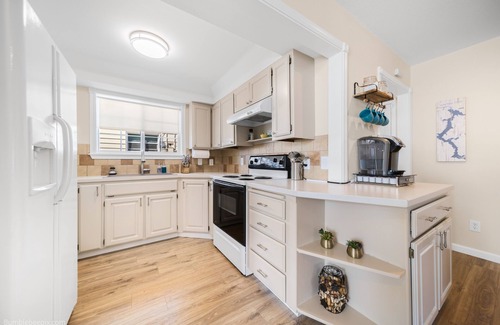 Garden District House | Cozy Home 1 Mile to Downtown CDA & Lake – King Beds and an EV Charger!