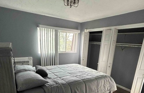 Lansing Condo | Cozy Home Away From Home