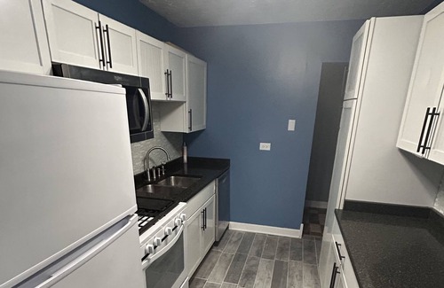 Lansing Condo | Cozy Home Away From Home