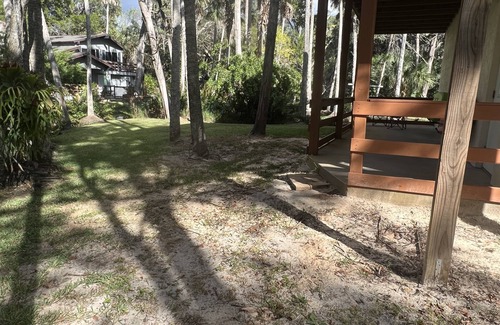 Brooksville House | Cozy home, beautiful views & swimming in a spring fed river among a wooded yard