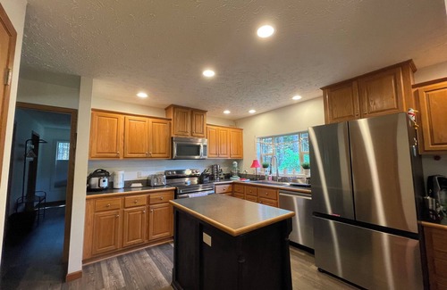 Ludington House | Cozy home in the pines & minutes from Ludington’s pristine Lake Michigan beaches