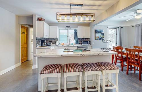 Lake Leelanau House | Cozy Home Located near Lakes & Trails, large backyard, eV charger & WIFI