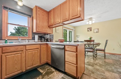 Traverse City House | Cozy Home | Near Lake, Hot Tub, Pets Ok & Fire Pit