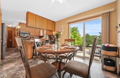 Traverse City House | Cozy Home | Near Lake, Hot Tub, Pets Ok & Fire Pit