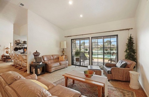 Stockton House | Cozy Home on a Lake and a sparkling pool with lush garden and Dock!