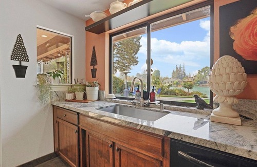 Stockton House | Cozy Home on a Lake and a sparkling pool with lush garden and Dock!