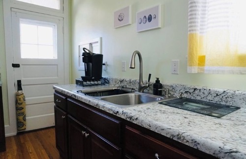 Roselawn Finance House | Cozy home on peaceful street in College Hill. Trails, park & tennis steps away.