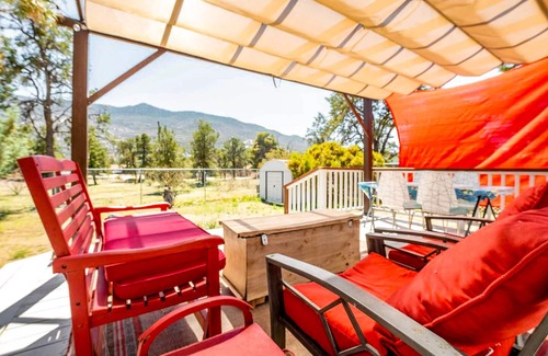 Pinyon Pines House | Cozy home with picturesque views of the mountains, a fireplace, and internet