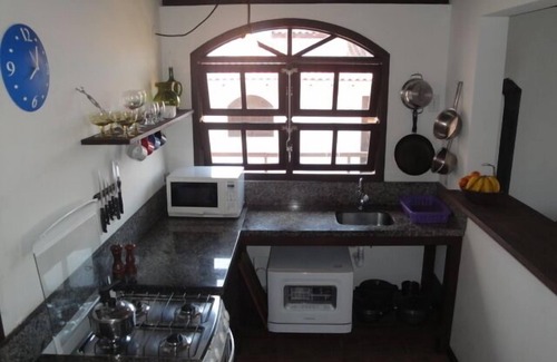 Morrinhos House | Cozy items. Large Balcony And Sea View In Morrinhos. Complimentary Wi-Fi.