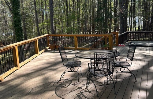 Henderson House | Cozy Kerr Lake waterfront home with private boat dock.