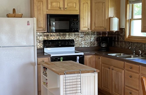 Gordon Cabin | Cozy lake cabin, enjoy fall colors on the deck overlooking the lake!