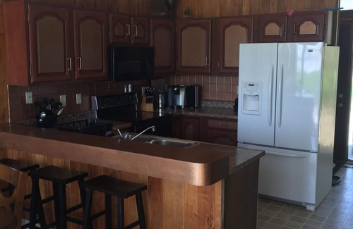 Verdi Cabin | Cozy Lake House with water on 3 sides! Walking distance to the Golf Course!