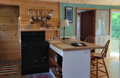North Ferrisburgh Cottage | Cozy lakefront 2 1/2 bedroom home on Lake Champlain, with dock and deck.