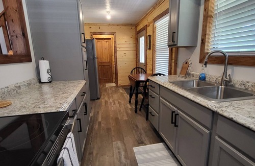 Gilmer Cabin | Cozy Lakefront 2-bedroom cabin in tranquil Big Sandy, TX.