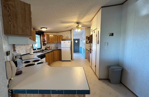 Walsenburg House | Cozy Lakefront Getaway - 3 Bed, 2 Bath Retreat with Scenic Walking Path