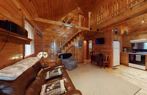 Greenville House | Cozy lakefront home on Sandy Bay w/common beach, boat mooring & gas grill