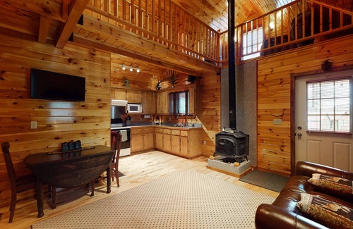 Greenville House | Cozy lakefront home on Sandy Bay w/common beach, boat mooring & gas grill