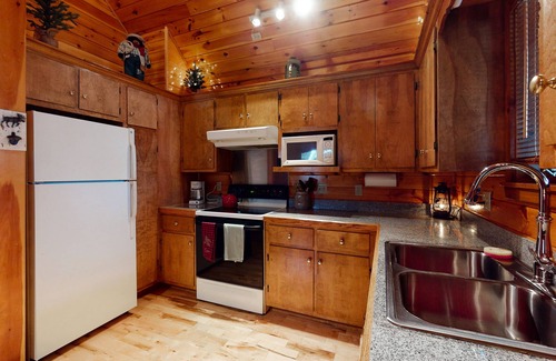 Greenville House | Cozy lakefront home on Sandy Bay w/common beach, boat mooring & gas grill