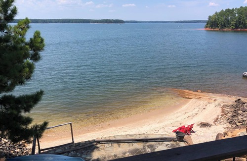 Modoc Cabin | Cozy Lakefront Log cabin with miles of view plus small beach!