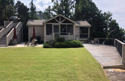 Modoc Cabin | Cozy Lakefront Log cabin with miles of view plus small beach!