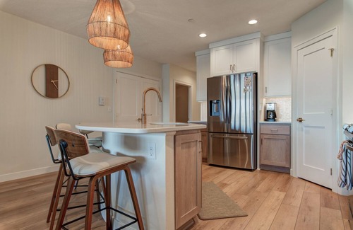 Arnolds Park Condo | Cozy lakefront retreat, first level condo lakeside overlooking East Lake Okoboji