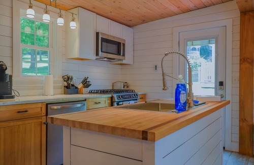 Hiwassee House | Cozy lakefront retreat with private dock, scenic views, updated interiors and serene outdoor seating